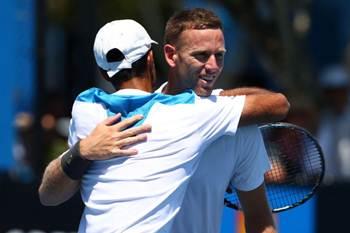 Yuki Bhambri hugs Michael Venus after victory is clinched