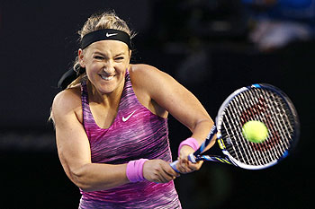 Victoria Azarenka of Belarus plays a backhand in her third round match against Yvonne Meusburger of Austria at the Australian Open in Melbourne on Saturday