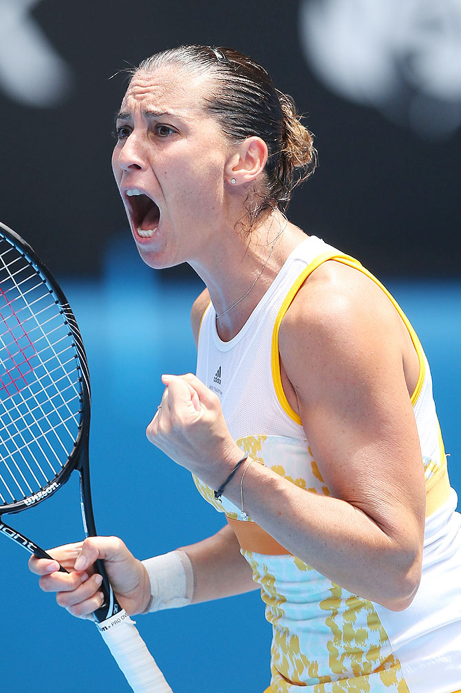 Flavia Pennetta of Italy celebrates winining her fourth round match against Angelique Kerber of Germany on Sunday