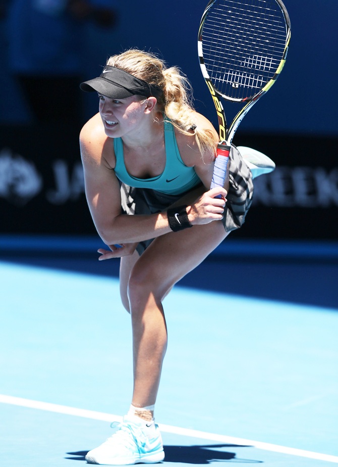 Eugenie Bouchard of Canada serves in her quarterfinal match against Ana Ivanovic