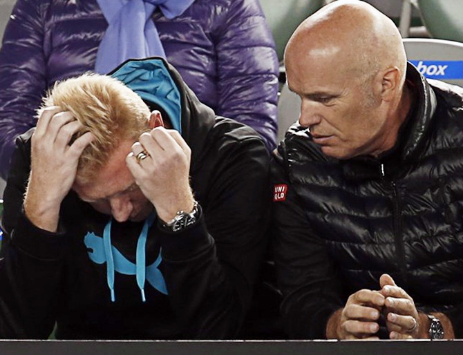 4Boris Becker (left), coach of Novak Djokovic of Serbia look dejected
