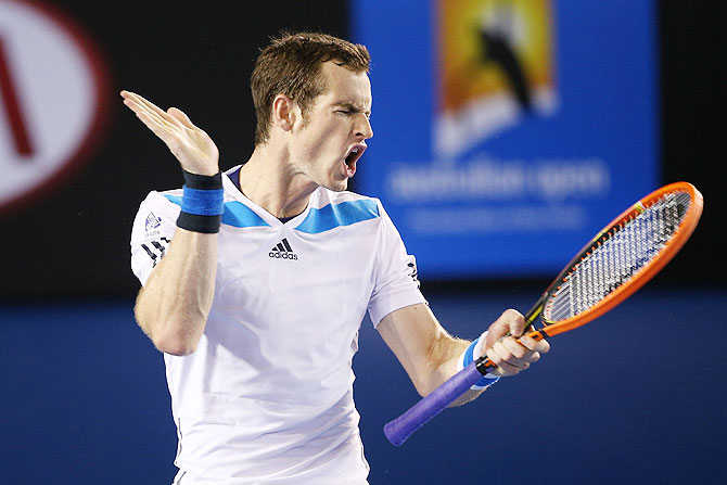 Andy Murray reacts to a point in his quarter-final against Roger Federer