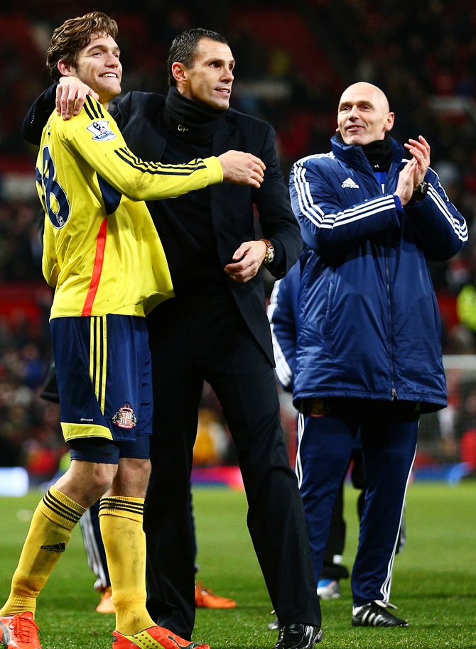 (From Left) Marcos Alonso of Sunderland and Gus Poyet the   Sunderland manager celebrate following their team's 2-1 victory
