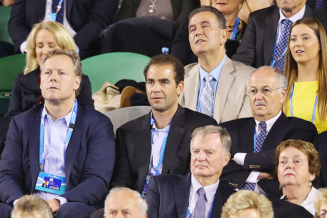 Former tennis player Pete Sampras watches Roger Federer and Rafael Nadal battle it out in the semi-final