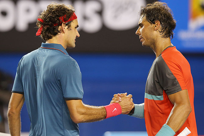Rafael Nadal of Spain shakes hands with Roger Federer of Switzerland after Nadal won their semi-final match on Friday
