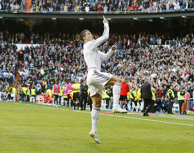 Real Madrid's Cristiano Ronaldo celebrates his goal during their La Liga match against Granada at the Santiago Bernabeu stadium in Madrid on Saturday