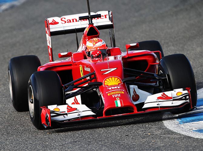 Kimi Raikkonen drives the new Ferrari's new car F14T