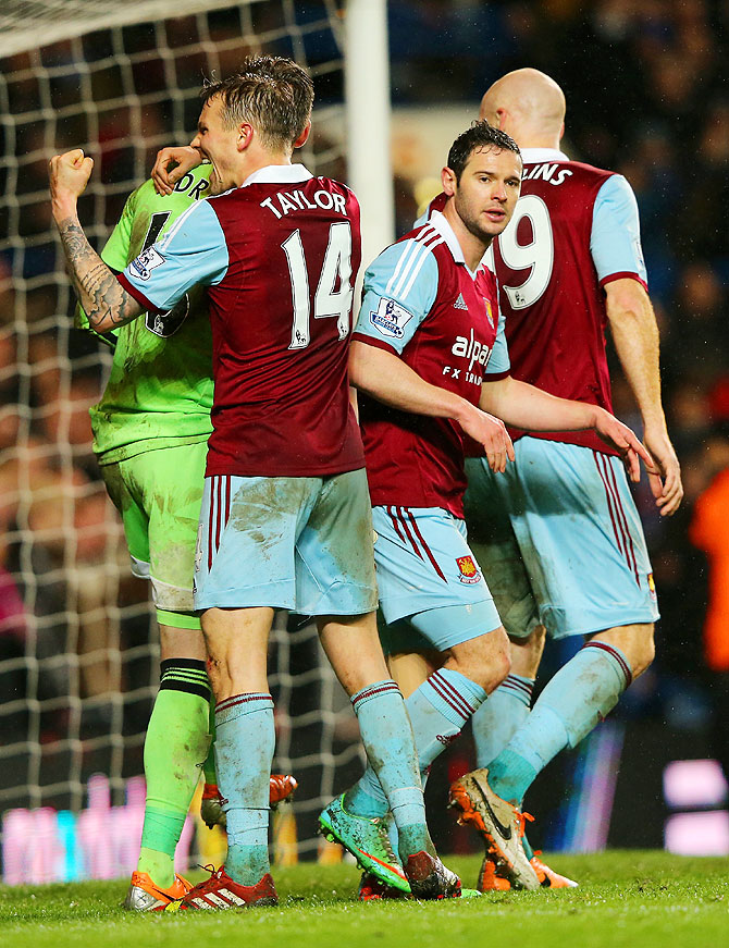 Goalkeeper Adrian of West Ham celebrates with teammates after their Premier League match against Chelsea at Stamford Bridge on Wednesday