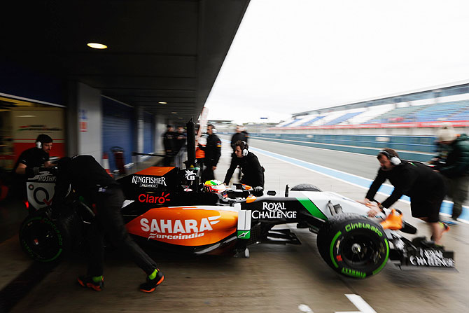 Sergio Perez of Mexico and Force India is pushed back into his team garage during day two of Formula One Winter Testing at the Circuito de Jerez in Jerez de la Frontera, Spain on Wednesday