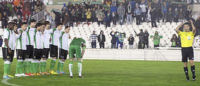 The referee blows his whistle to stop the match as Racing Santander players refuse to play at the start of their King's Cup quarter-final second leg match against Real Sociedad in Santander, on Thursday