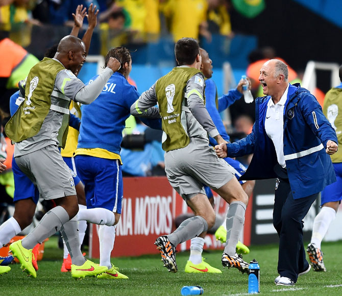 Brazil coach Luiz Felipe Scolari celebrates with his players