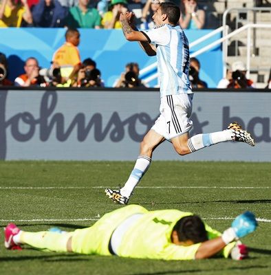 Argentina's Angel Di Maria celebrates scoring against Switzerland during extra -time in the 2014 World Cup Round of 16 game at the Corinthians arena in Sao Paulo.