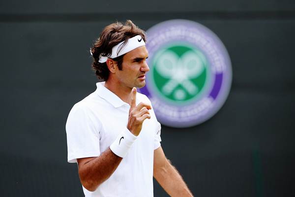 Roger Federer of Switzerland during his fourth round match against Tommy Robredo of Spain 