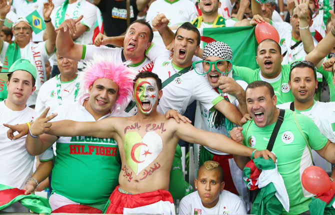 Algeria fans cheer at Arena da Baixada in Curitiba, Brazil