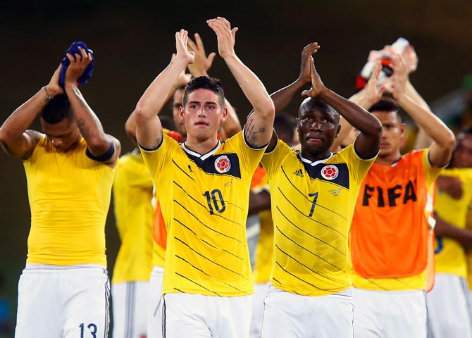 Colombia's players acknowledge the fans after their victory