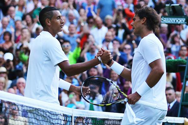 Nick Kyrgios of Australia shakes hands with Rafael Nadal of Spain after their match