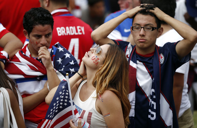 USA fans react after their team was defeated by Belgium 