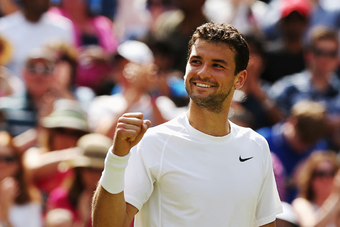 Grigor Dimitrov of Bulgaria celebrates after winning his quarter-final match against Andy Murray of Great Britain
