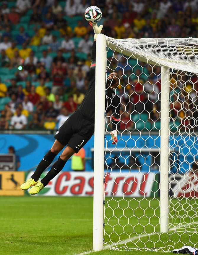 US goalkeeper Tim Howard makes a fingertip save against Belgium