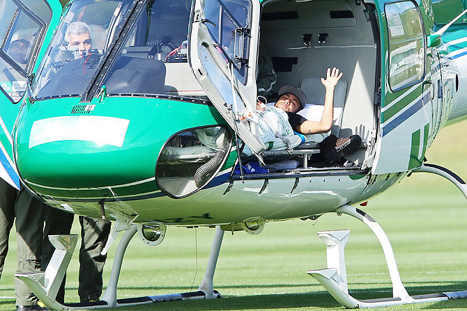 Brazil's Neymar is seen inside a medical helicopter at the Granja Comary training center, in Teresopolis, Brazil on Saturday