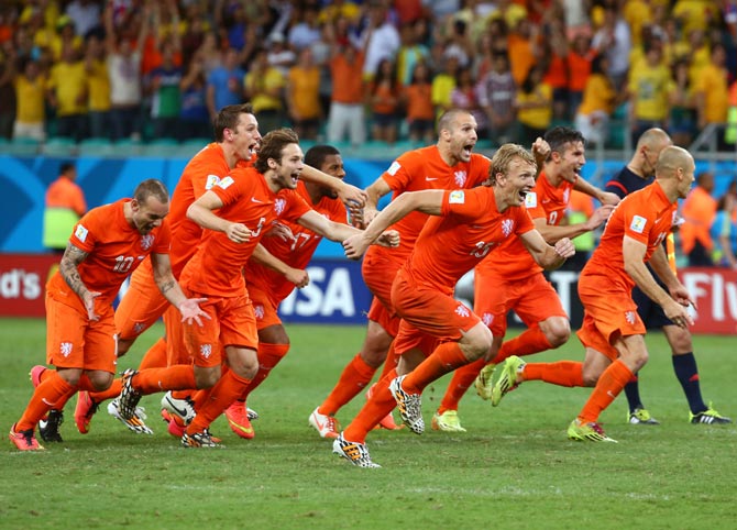 Netherlands celebrate after defeating Costa Rica in their quarter-final match