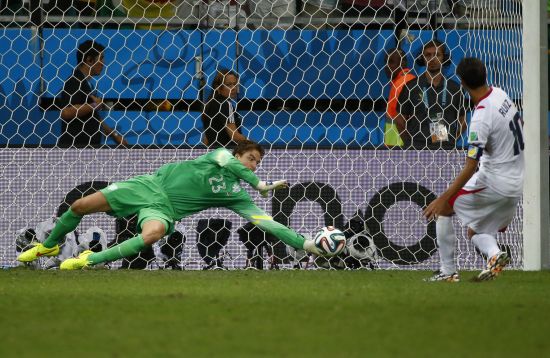 Goalkeeper Tim Krul of the Netherlands saves a shot by Costa Rica's Bryan Ruiz