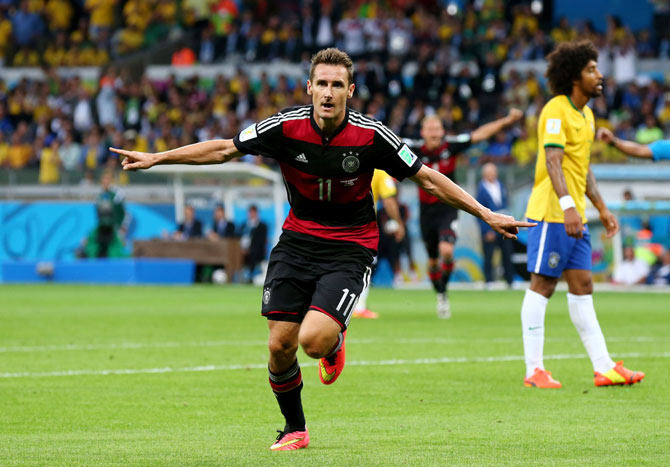 Miroslav Klose of Germany celebrates scoring his team's second goal on Tuesday