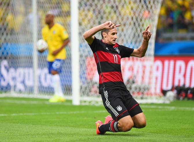 Miroslav Klose of Germany celebrates scoring his team's second goal 