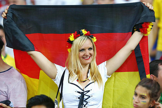 A Germany fan celebrates after their win over Brazil on Tuesday