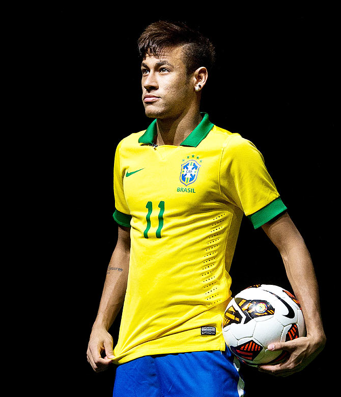 Brazilian football star Neymar presents his new Nike football boots