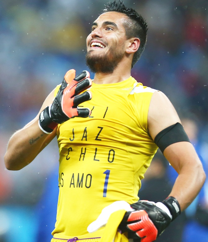Sergio Romero of Argentina celebrates defeating the Netherlands in a shootout during the 2014 FIFA World Cup Brazil Semi Final match