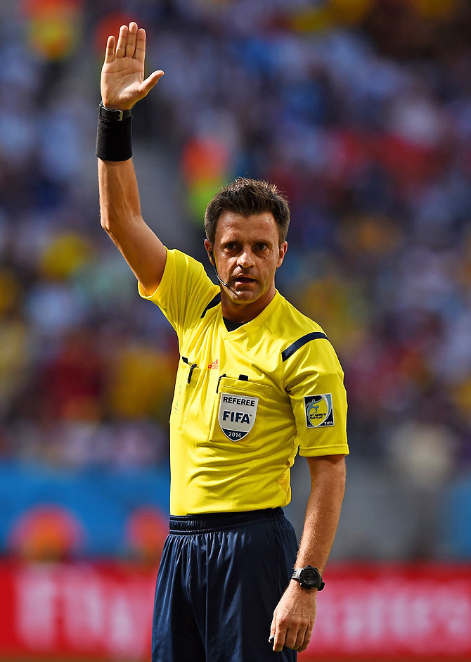 Referee Nicola Rizzoli gestures