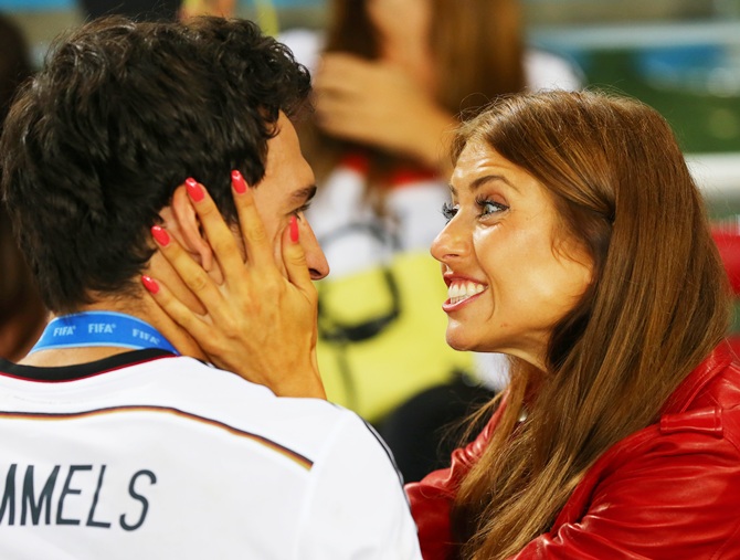 Mats Hummels of Germany celebrates with girlfriend Cathy Fischer