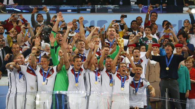 Germany's players lift the World Cup trophy as they celebrate their 2014 World Cup final win against Argentina