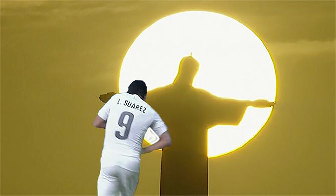 A meme showing Luiz Suarez taking a bite of the hand of Christ the Redeemer