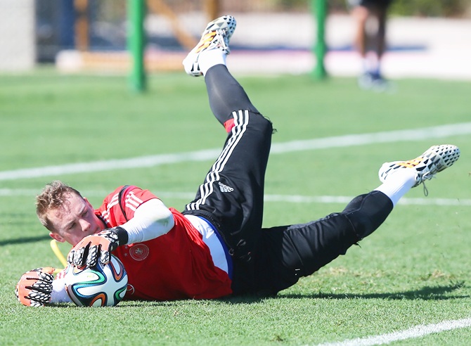 Goalkeeper Manuel Neuer makes a save during the German National team training session