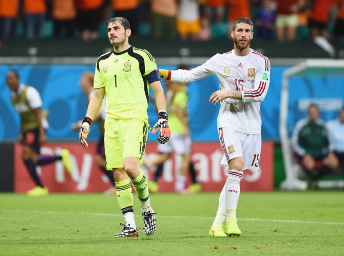 Goalkeeper Iker Casillas, left, and Sergio Ramos of Spain react after conceding a goal against Netherlands
