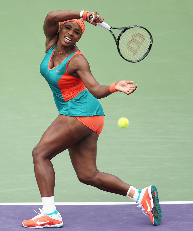 Serena Williams of the United States plays a forehand