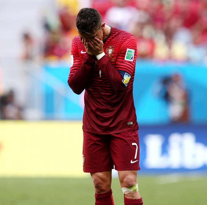 Cristiano Ronaldo of Portugal looks dejected after the World Cup Group G match against Ghana