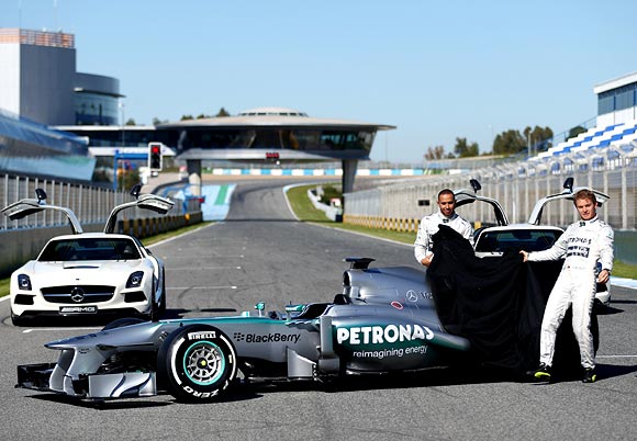 Lewis Hamilton and Nico Rosberg unveil the new Mercedes F1 car