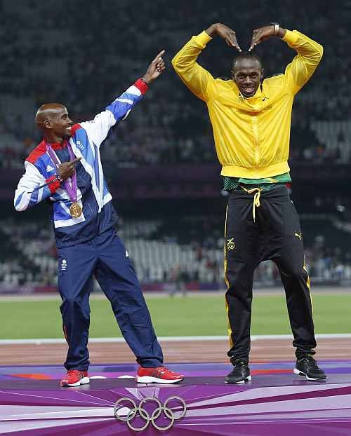 Jamaica's Bolt with Britain's Mo Farah