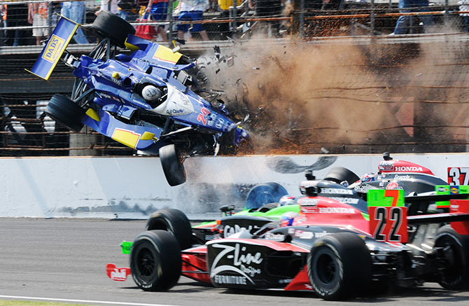 Dreyer & Reinbold Racing driver Mike Conway flies through the air after crashing with a fellow driver