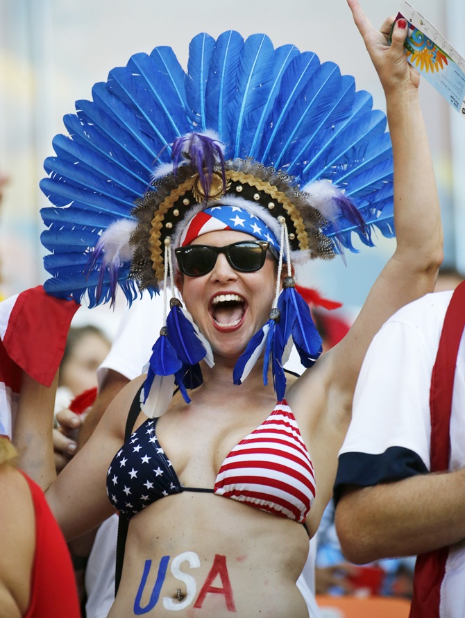 A US fan cheers during the match between Portugal and United States