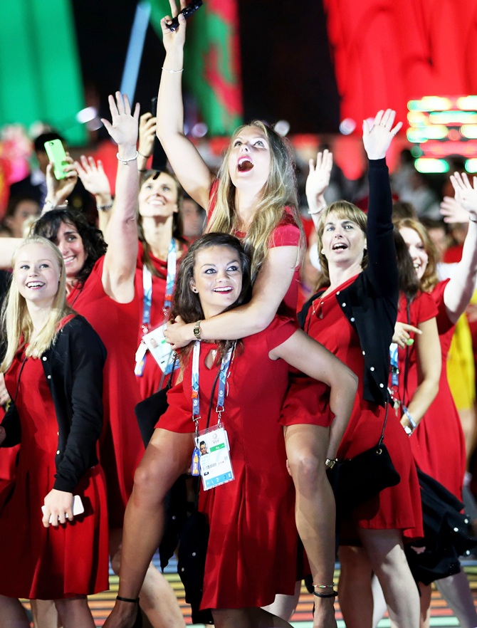Athletes from Wales soak up the atmopshere during the Opening Ceremony for the Glasgow 2014 Commonwealth Games at Celtic Park