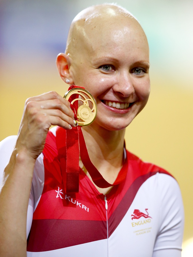 Joanna Rowsell of England poses with her Gold medal