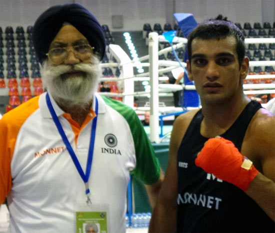 Mandeep Jangra (right) with Indian national boxing coach GS Sandhu