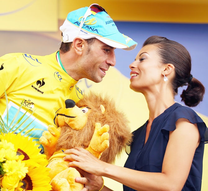 Vincenzo Nibali of Italy and Astana Pro Cycling celebrates winning the eighteenth stage