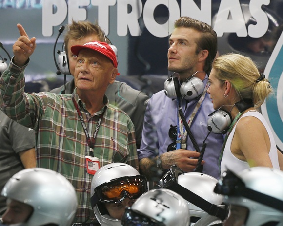 David Beckham (second right) watches with Niki Lauda