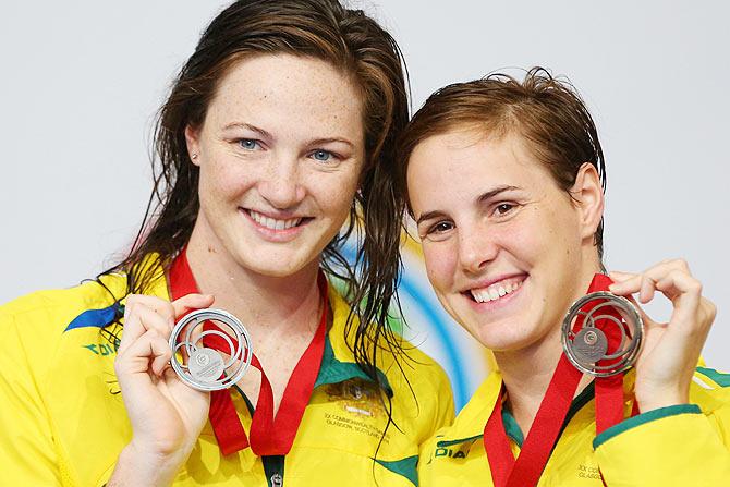 Silver medallist Cate Campbell (left) of Australia and bronze medallist Bronte Campbell of Australia pose during the medal ceremony for the Women's 50m Freestyle Final at Tollcross International Swimming Centre on Saturday