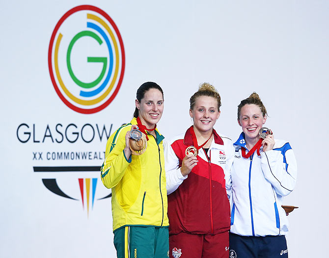 Gold medallist Siobhan O'Connor of England poses with silver medallist Alicia Coutts of Australia and bronze medallist Hannah Miley of Scotland during the medal ceremony for the Women's 200m Individual Medley Final at Tollcross International Swimming Centre on Sunday